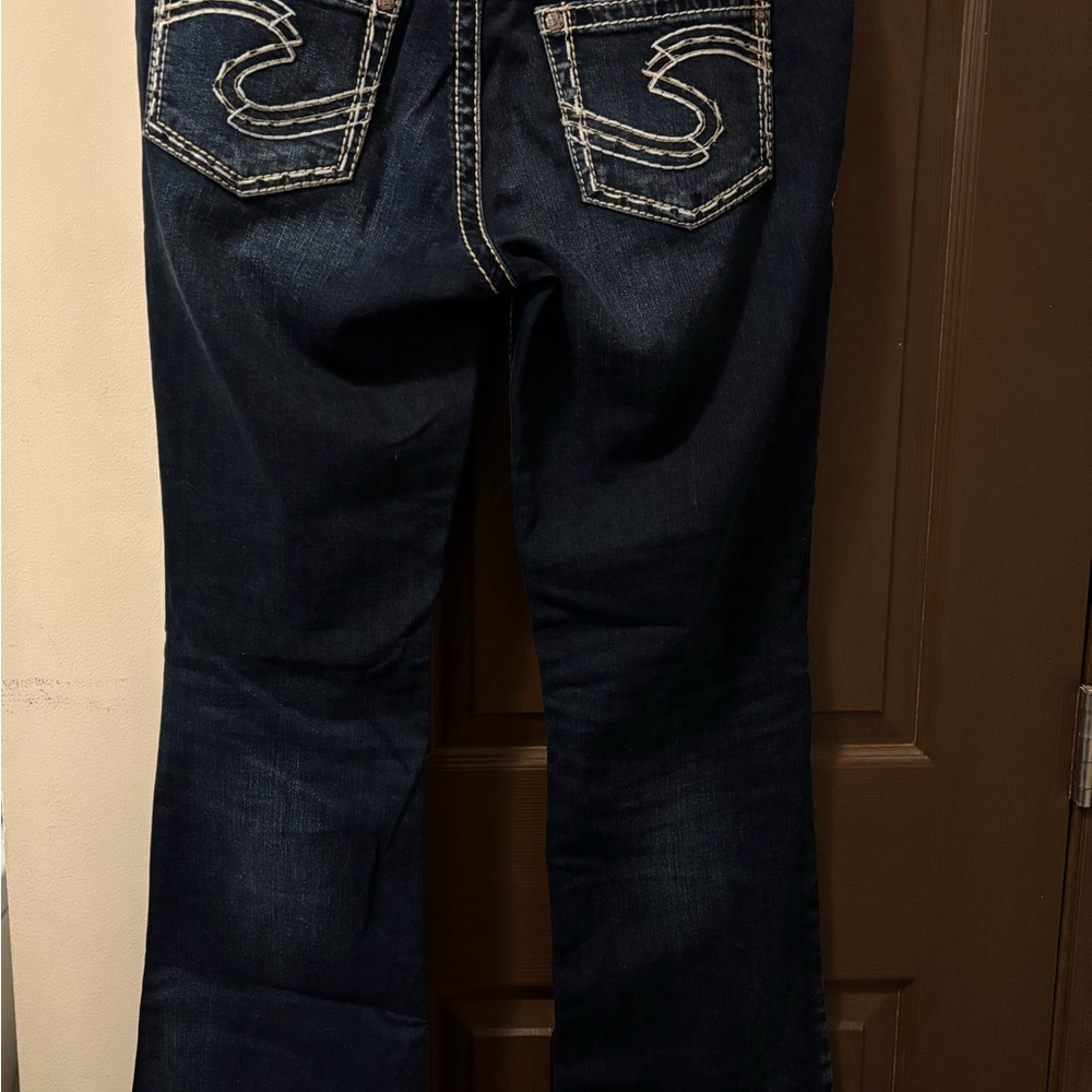 Silver Jeans Blue Boot Cut Denim with Signature Stitching